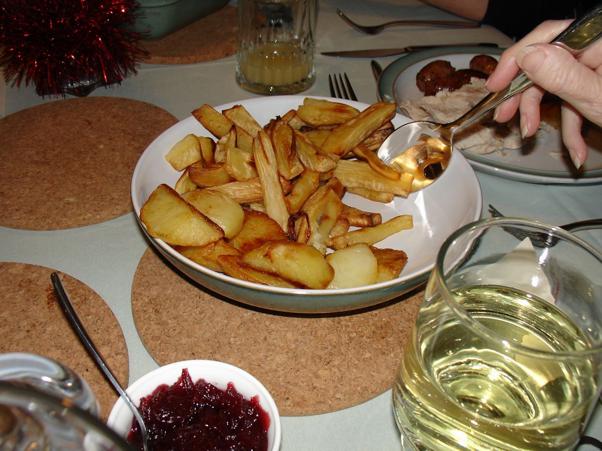 Christmas dinner: roast parsnips and potatoes